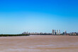 Rosario, Santa Fe, Argentina. Skyline of the city. Panoramic view of Parana river and the islands. Copy space in the blue sky.