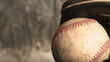 Old baseball used in game closeup with glove and copy space on background for sport.