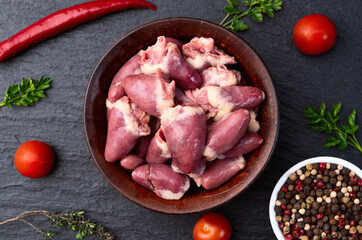 Poster - Raw chicken giblets hearts , meat background