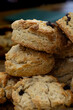 A pile of fresh scones, with a shallow depth of field
