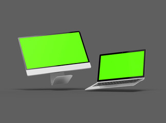 3d render of desktop and laptop with green screen on a dark background