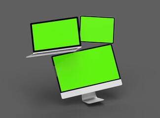 3d render of desktop, laptop and tablet with green screen on a dark background