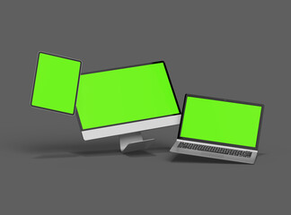 3d render of desktop, laptop and tablet with green screen on a dark background