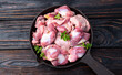 Raw chicken giblets gizzard ( stomach ) , meat background