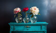 Colorful peony flowers in individual green glass vases above a pastel light blue rustic table.