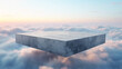 A large concrete platform floating above the clouds under a soft sunset sky.