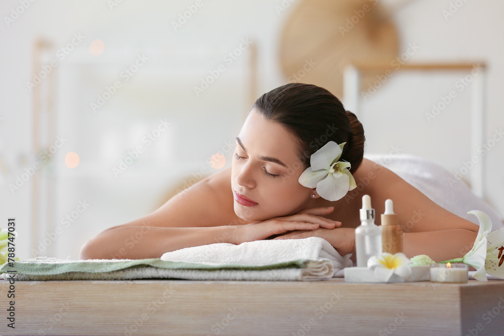 Young woman relaxing in spa salon, closeup