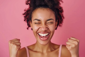 Happy woman clenches her fists feeling euphoric and rejoicing in her success, pink background back, Generative AI.