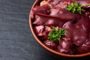 Poster - Raw chicken giblets liver, meat background.