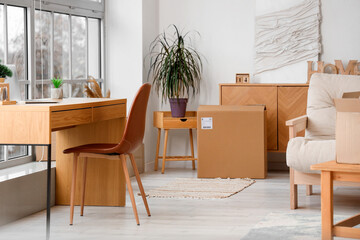 Poster - Interior of living room with table and parcel