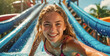 Portrait of a beautiful girl in a water park in summer