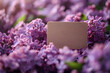 Empty rectangle label mockup with purple lilac flowers. Blank price, gift, sale, designation, ​indication, medicine, cosmetics, title or gift tag template with flowers background.