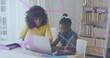 African American mother and daughter are looking at laptop in a home office