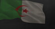A flag with green and white sections and red crescent and star is waving