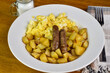 scramble eggs served with home fries and sausages