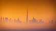 Dubai, United Arab Emirates - Jan 12 2024, 4k, Panoramic view of downtown Dubai skyscrapers, with Burj Khalifa in the middle, at dawn in a haze, a view from the sea, Dubai, United Arab Emirates 