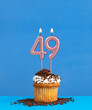 Candle number 49 - Birthday card with cupcake on blue background