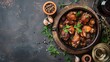 Baked chicken thighs with herbs in rustic ceramic dish, wine, and spices on dark background