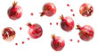Ripe pomegranates falling over isolated white transparent background