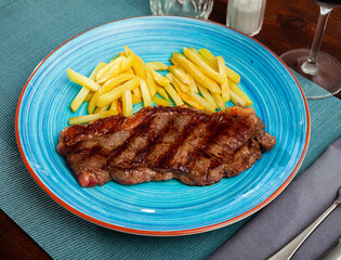 Wall Mural - Grilled beef sirloin with roasted potatoes on plate