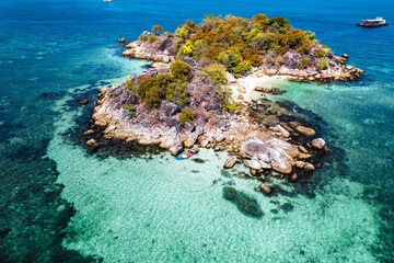 Wall Mural - Aerial view of  island and clear water