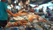 © Justlight - An out of focus image of a seafood market with the chaotic yet picturesque scene of fishermen unloading their boats and eager customers browsing through the array of seafood on display. .