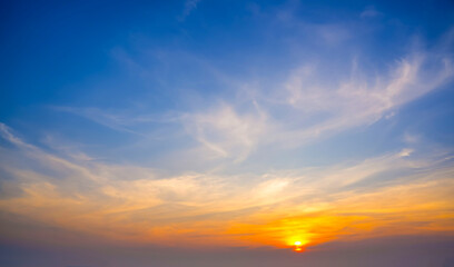 Wall Mural - Colorful cirrus cloudy sky at sunset. Gradient warm cold color. Sky texture, abstract nature background