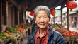 Portrait of senior Chinese woman in rural village market 