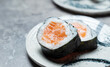 Salmon roll sushi on plate	