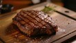 Large Wagyu ribeye with beautiful texture, delicious to eat on a wooden tray.