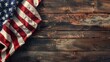 Embrace the spirit of Happy Independence Day with an American flag displayed against a rustic wood backdrop, offering ample copy space.