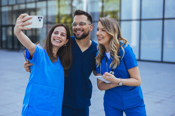 Doctors, friends and selfie in hospital for team building, solidarity or diversity for social media post. Doctor, group and teamwork with black man, women and peace for comic smile, happy and support