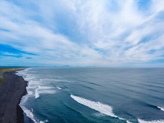 Aerial top view Landscape of Khalaktyrsky beach with black volcanic sand coast of Ocean Kamchatka, Russia