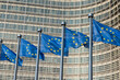 © respiro888 - Fluttering European Union flags in a row in Brussels, Belgium. Close up