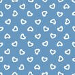 Vector illustration. Seamless pattern of small bright hearts on a blue background. Textile printing, fabric design, packaging, wrapping paper, children's wallpaper