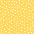 Vector illustration. Seamless pattern of small light hearts on yellow background. Textile printing, fabric design, packaging, wrapping paper, children's wallpaper