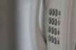 Classic telephone buttons on blurred background