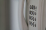 Fototapeta Tulipany - Classic telephone buttons on blurred background