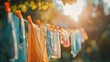 A close-up of freshly washed garments pinned to a clothesline, fluttering gently in the breeze under the warm sunlight.