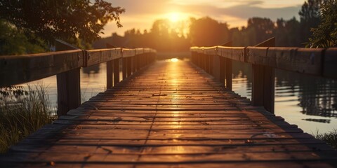 Wall Mural - A wooden bridge over a body of water with the sun setting in the background