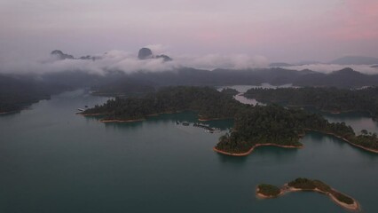 Wall Mural - Aerial view of Khao Sok national park at sunrise, in Cheow lan lake, Surat Thani, Thailand