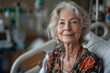 © Larisa AI - An elderly woman is pictured seated alone in a hospital room, looking frail but peaceful in a complex, emotionally charged setting