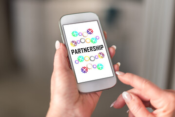 Sticker - Partnership concept on a smartphone