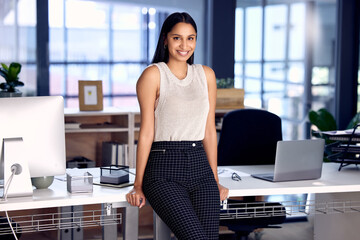 Poster - Design, portrait and smile of business indian woman in office at night for project management. Administration, desk and mission with confident employee in creative agency or workplace for development