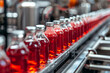 © nameera_hasan - A close-up of a beverage factory production line shows the complex and efficient process of manufacturing and packaging juice products