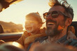 Happy Father and Son Enjoying a Sunset Drive in a Cabrio