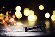© alexkich - vintage key over old wooden surface with back light. Double exposur night city.