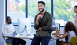 © peopleimages.com - Businessman, portrait and confidence in office with computer for business, startup and management. Manager, technology and smile for call center, customer service and support with team leadership