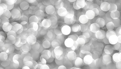 Wall Mural - Elegant abstract grey light bokeh background with defocused blur for sophisticated design projects