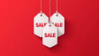 white sale tag banner on a red background